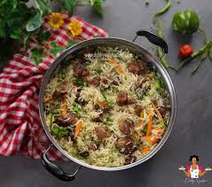 Ghana Coconut Rice, salad, and Goatmeat 